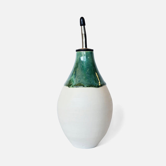 Olive oil  with green top and white base on a white background